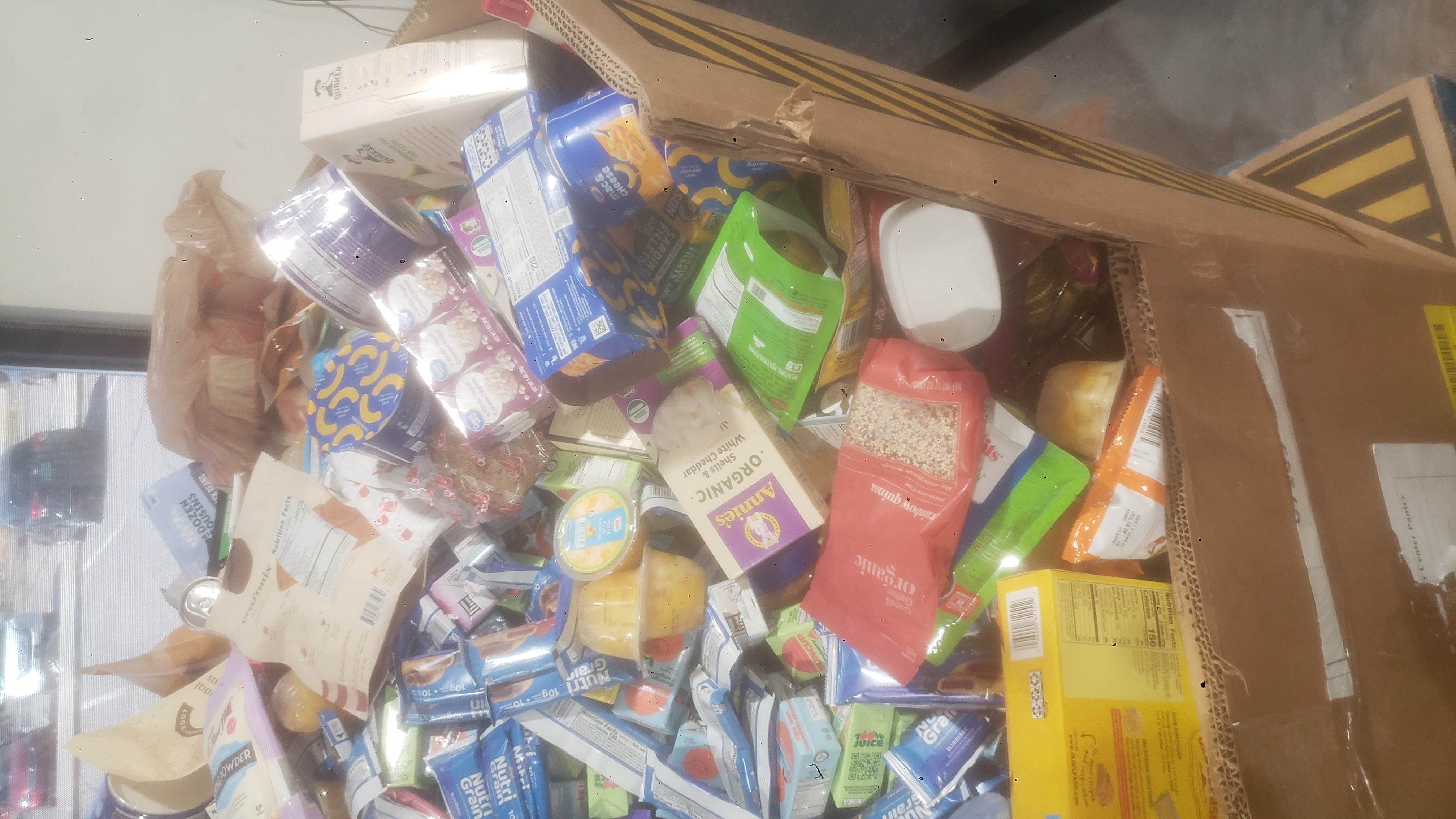 Food filled cardboard container.